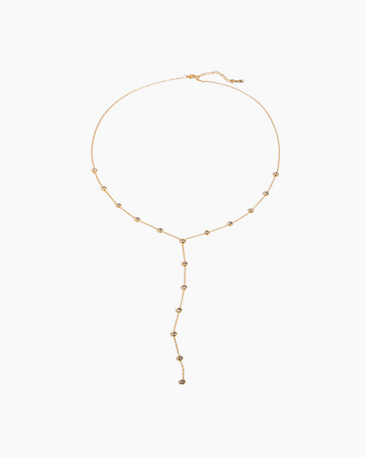 Gold necklace on a white background