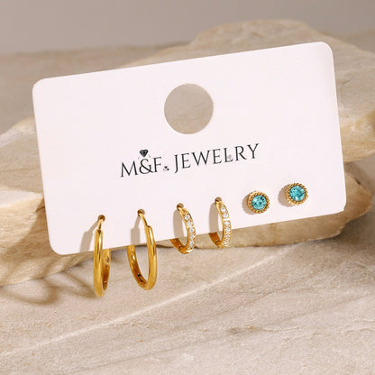 tiny gold hoop huggie earrings with zircon crystals, lightweight and hypoallergenic