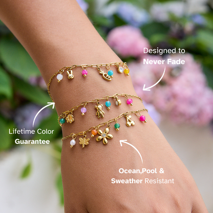 Gold bracelet with bunny, carrot, smiley face and bright beads
