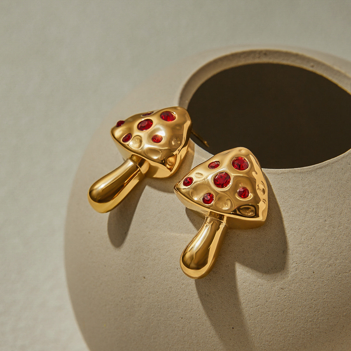 Gold mushroom studs resting