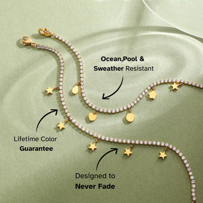 Flat lay of gold tennis bracelets with dangling celestial charms