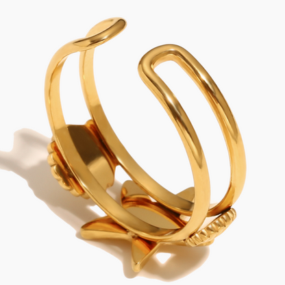 Elegant hand styling with gold starfish cocktail ring