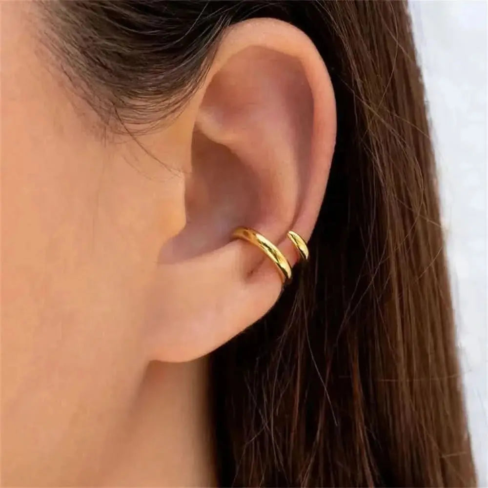 Double Hoop Ear Cuff - Elevate your ear stack with this sleek double hoop ear cuff. Perfect for adding a chic, modern touch to your everyday look.