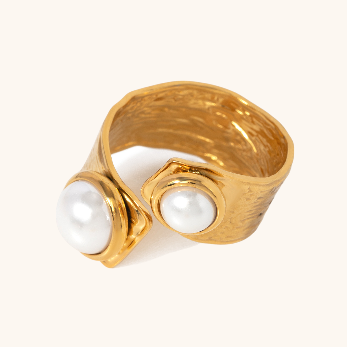 double pearl open ring with hammered gold finish on white background
