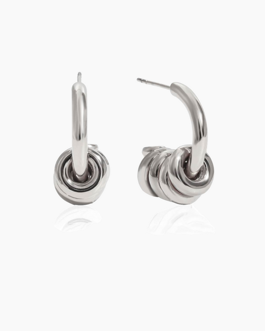 Silver hoop earrings on a white background