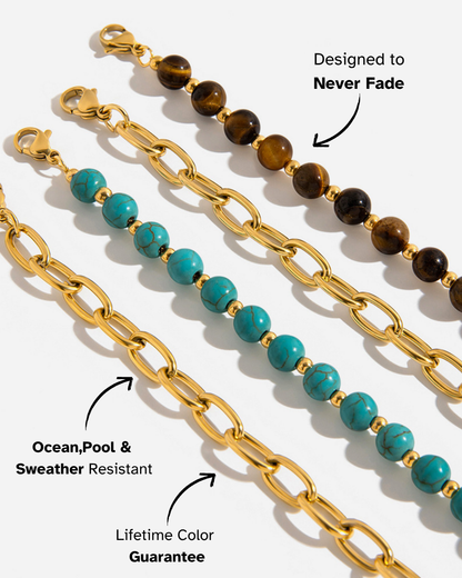 Two necklaces with gold chains and colored beads on a white background