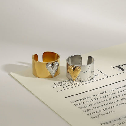 Stylish heart design open ring placed on minimalistic magazine