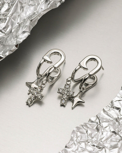 Stylish silver dangle earrings with punk-style safety pin design and cubic zirconia