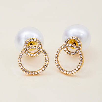 Dainty gold earrings with large pearl back and rhinestone circles