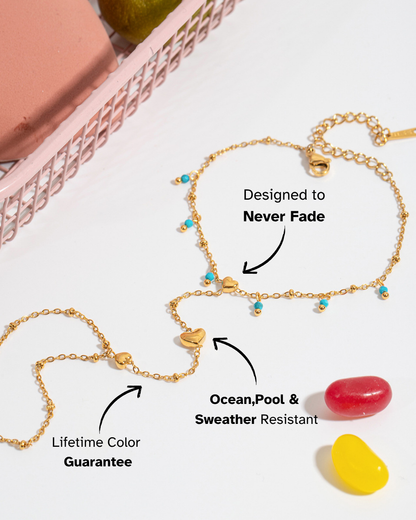 Gold bracelets with heart charms on a white surface with text highlighting features.