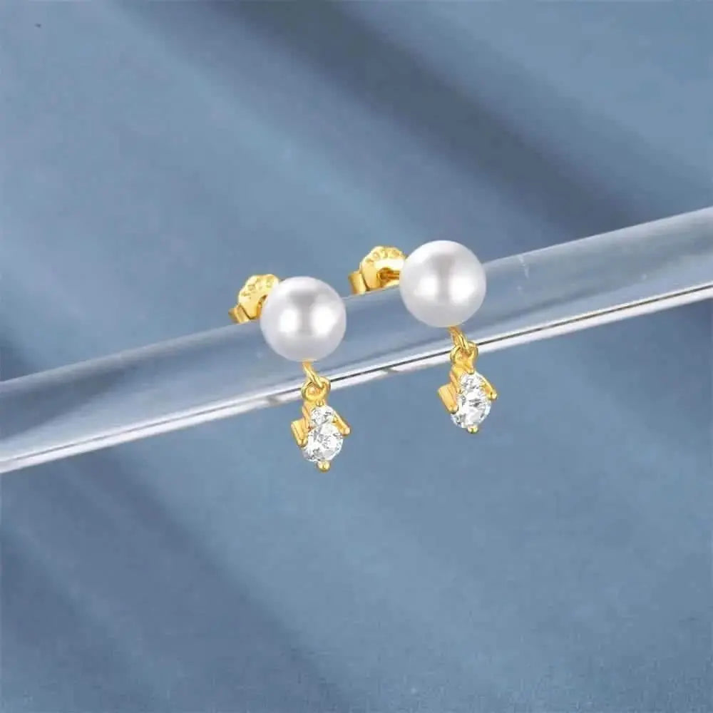 Boucles d'oreilles pendantes en perles et zircones