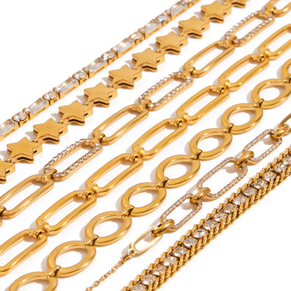 Flat lay of ellipse link bracelet with white silk and sunglasses, summer ready