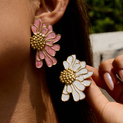 Lightweight pink flower earrings on ear for summer outfit