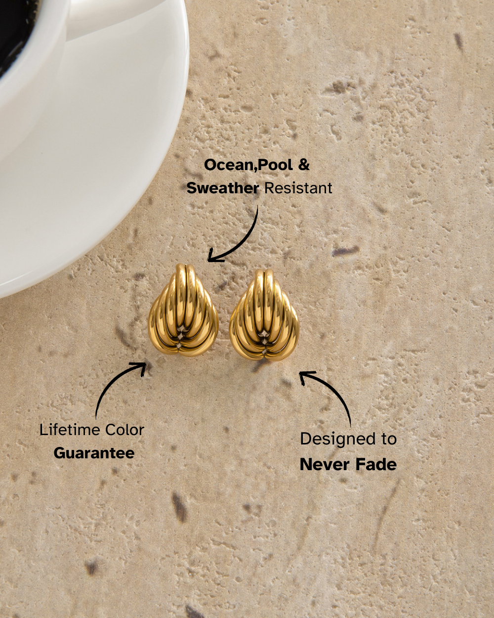 Gold earrings on sand with text highlighting features