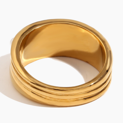 Gold ring on a white background