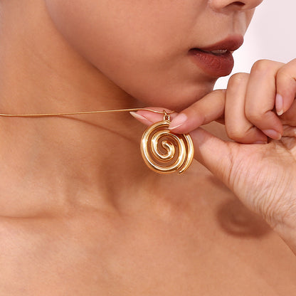 Elegant spiral pendant on sleek snake chain displayed on white background
