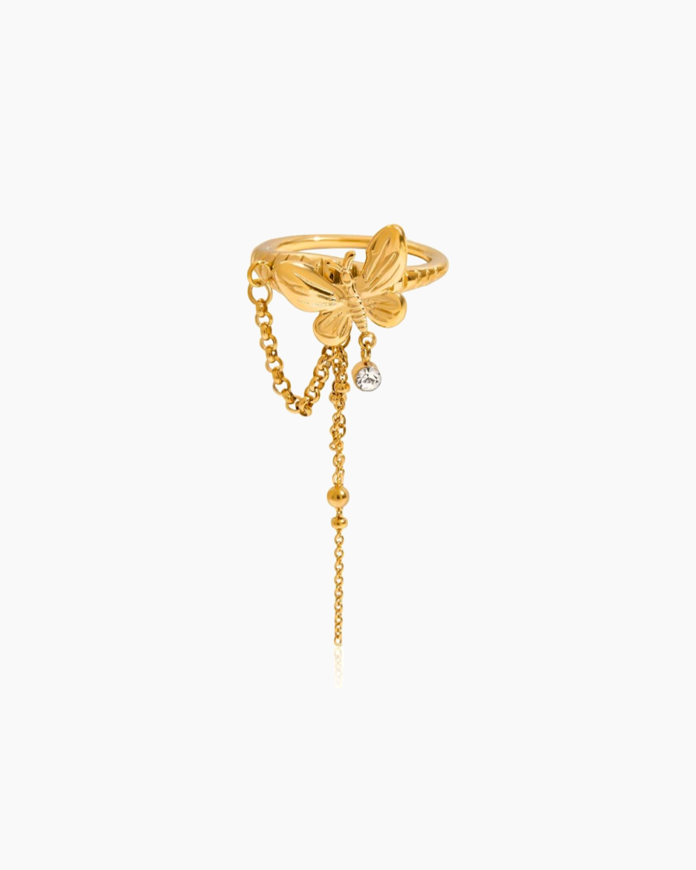 Gold ring with butterfly design and chain on a white background