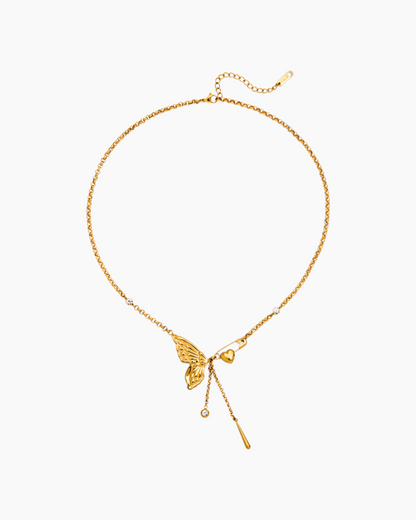 Gold necklace with a butterfly pendant on a white background