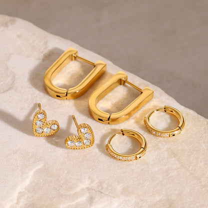 Chunky gold rectangular hoop earrings with clean modern shape, minimal chic style