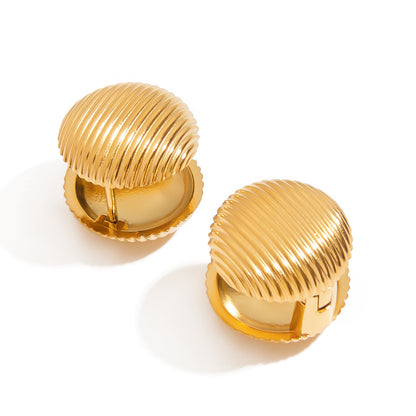 Back view of gold dome clip-on earrings with secure closure, shiny metal detailing