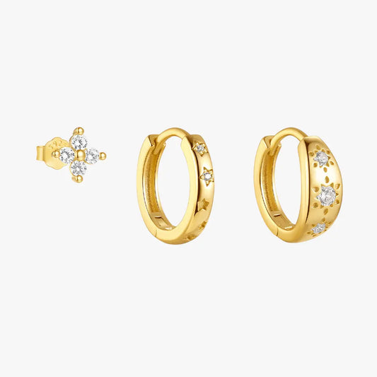 Gold 925 sterling silver zirconia three-piece earring set featuring a flower stud earring and two star-patterned hoops.