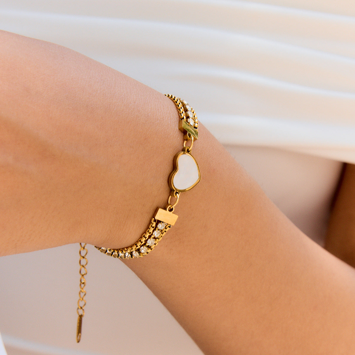 waterproof heart bracelet styled on arm, perfect for beachwear
