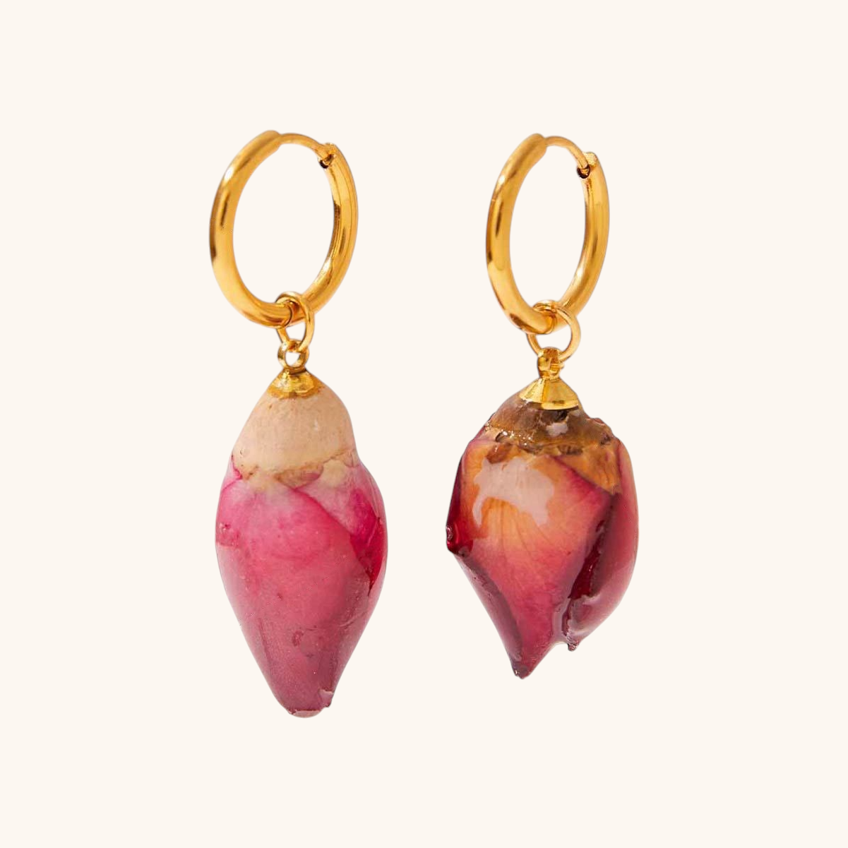 Pair of handmade real rosebud gold hoop earrings on white background