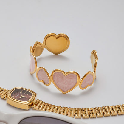summer heart bracelet styled with sunglasses and watch