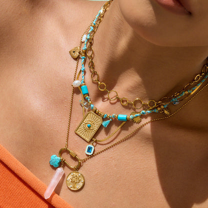 Summer necklace featuring ocean charms, pearls, and colorful beads