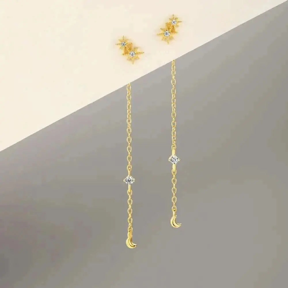 Pendientes de borlas de cadena larga con estrellas y lunas