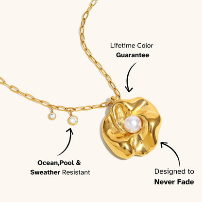 Gold flower necklace with pearl center and zircon charms on cream background, perfect for elegant summer outfits.