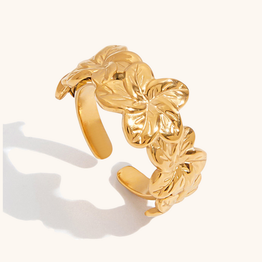Close-up of Golden Bloom Statement Ring showing sparkling CZ petals in soft daylight