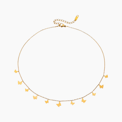 Gold necklace with butterfly pendants on a white background