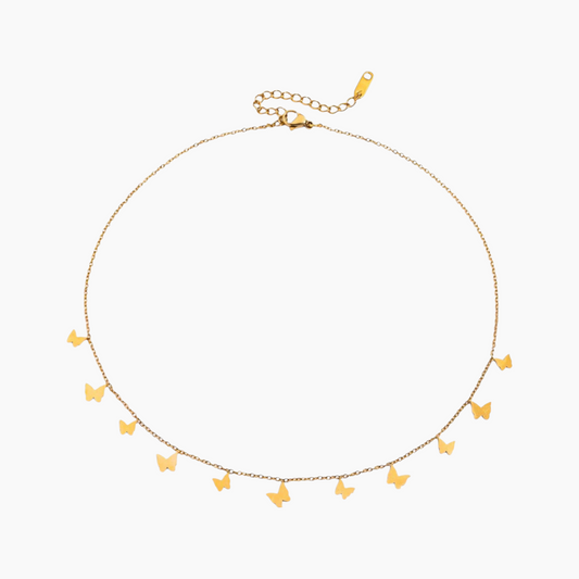 Gold necklace with butterfly pendants on a white background