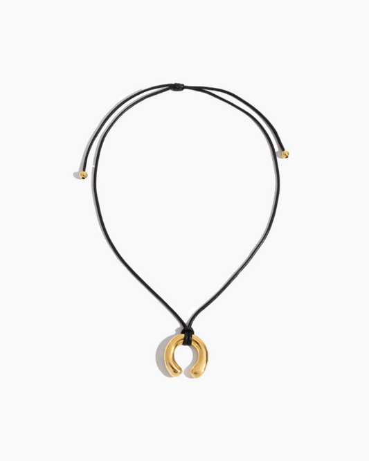 Necklace with a gold pendant on a white background