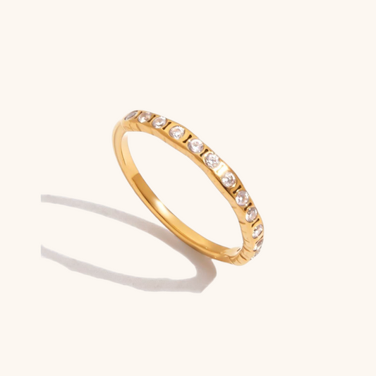 Full zircon-studded gold band with textured edges