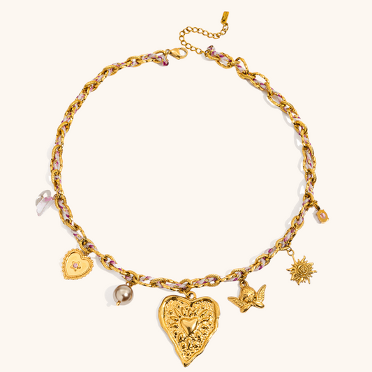 Gold heart charm necklace with pink woven chain details