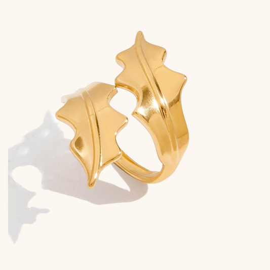 Gold leaf design open ring on white background
