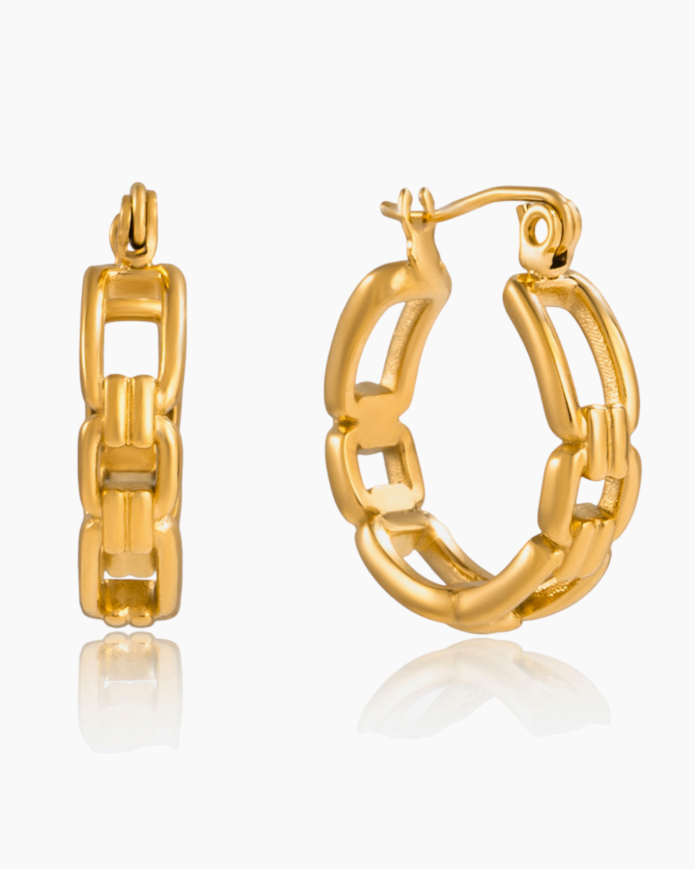 Gold hoop earrings on a white background