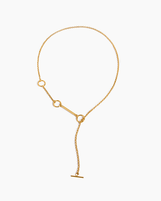 Gold necklace on a white background