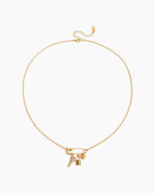 Gold necklace with a lock pendant on a white background