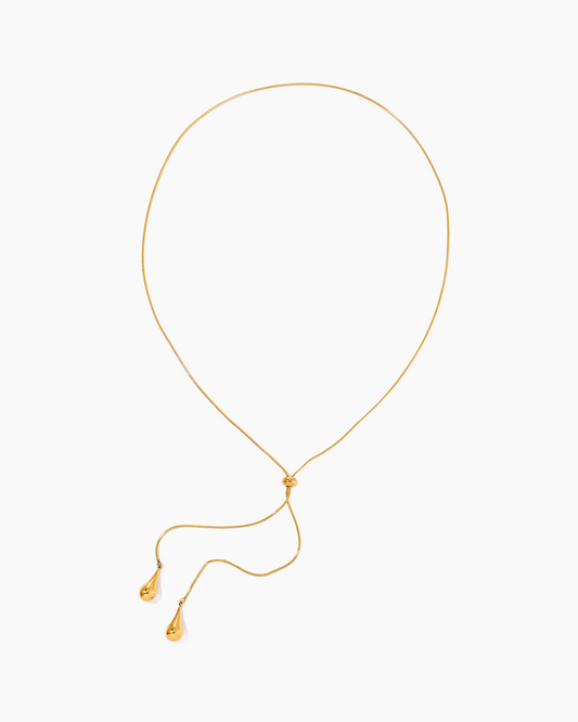 Gold necklace on a white background