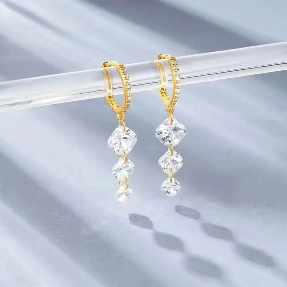 Boucles d'oreilles créoles pendantes de luxe en zircone