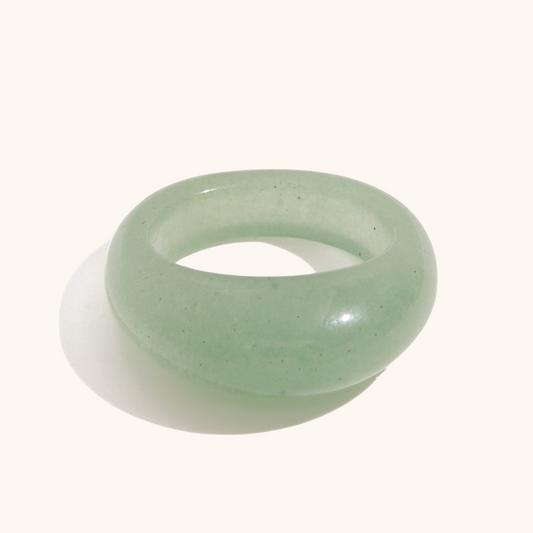Bold green resin ring styled poolside for summer look