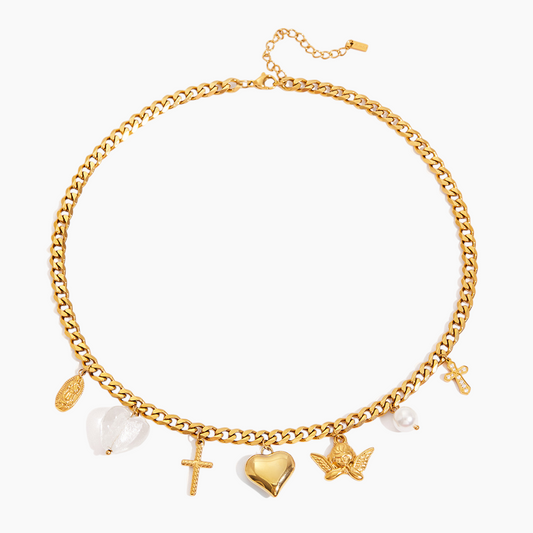 Gold chain bracelet with various charms on a white background