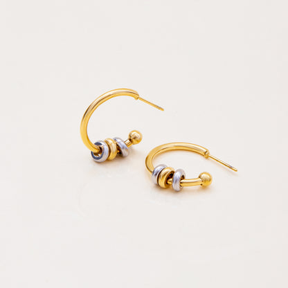 Minimalist gold and silver hoops for daily wear