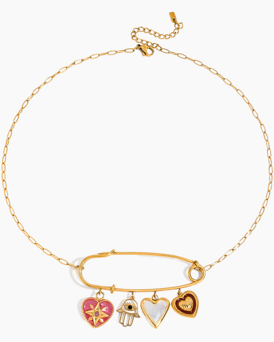 Gold bracelet with heart-shaped charms on a white background