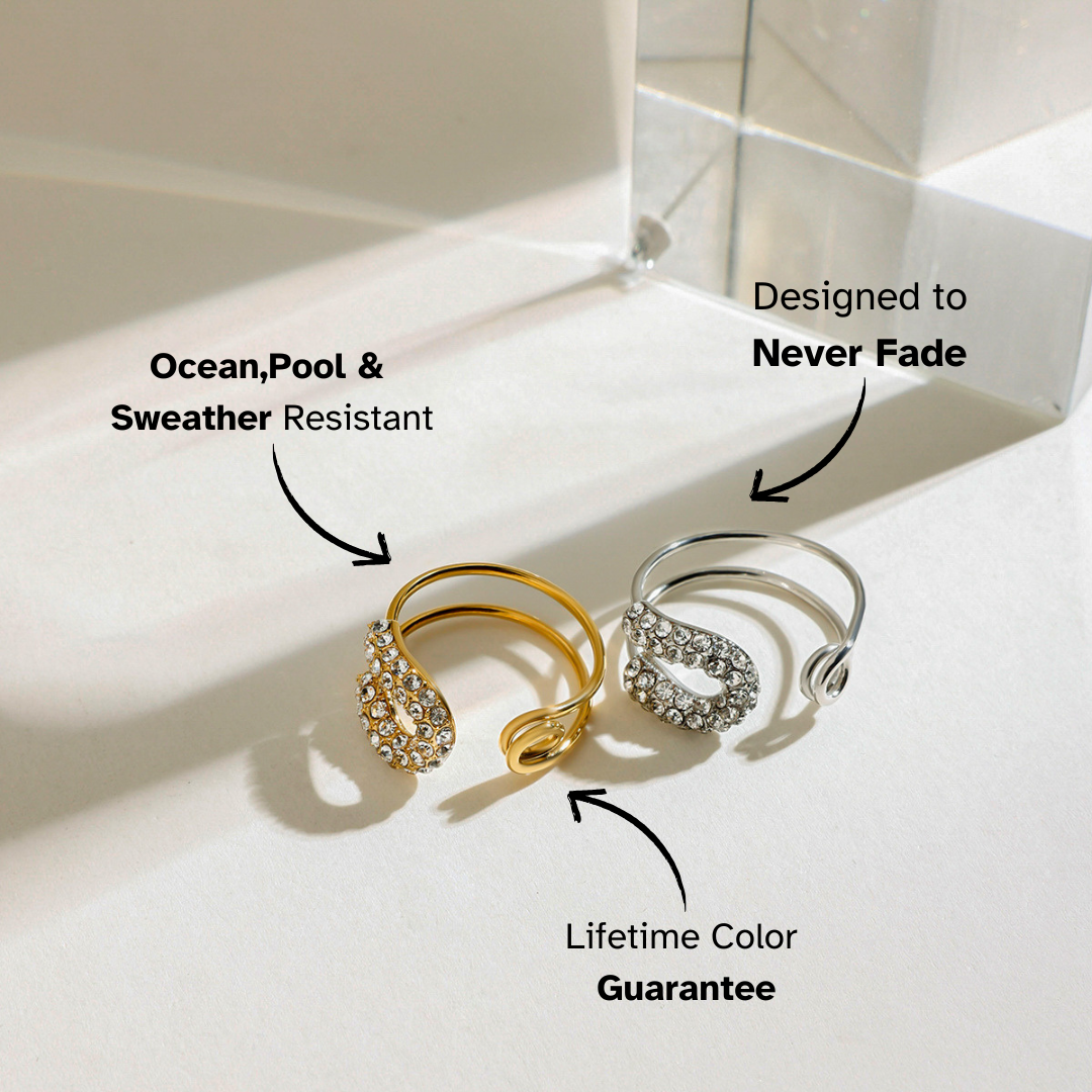 Top-down view of lustrous spiral ring displaying smooth curved metal.