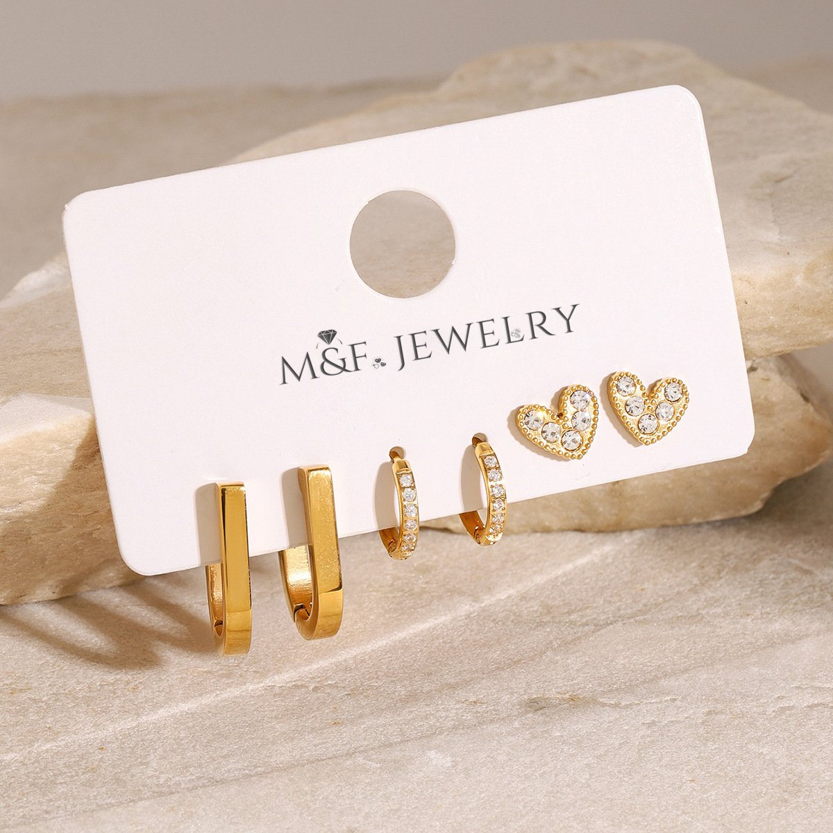 Small round gold hoops with clear crystals, elegant everyday earring choice