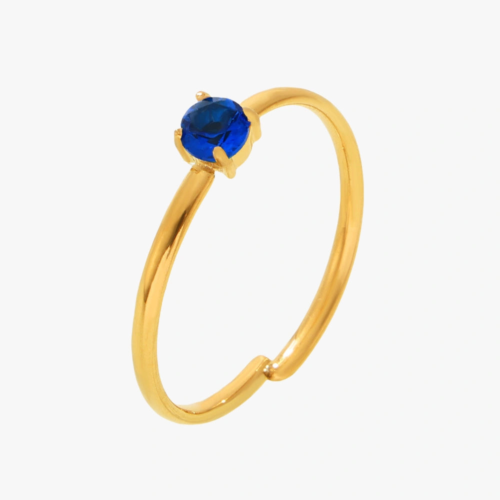 Gold minimalist adjustable ring with blue zircon stone.